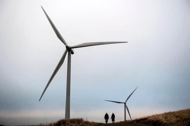 The shift to renewable power-generation is well under way, but more effort is needed to 'make a serious dent in' CO2 production globally, says Mr Richardson. Picture: Andy Buchanan/AFP/via Getty Images.