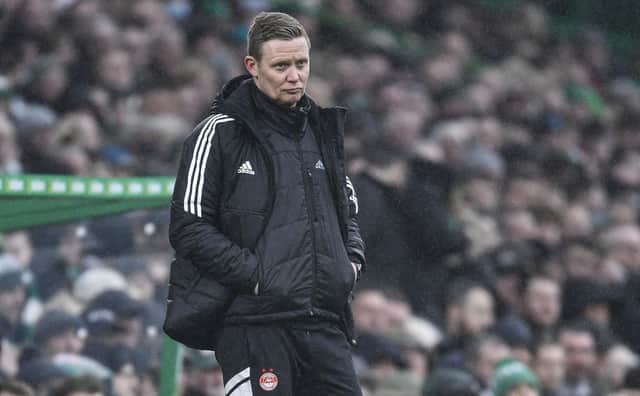 Aberdeen Interim manager Barry Robson sported a dejected look as his side could not prove competitive in losing 4-0 at Celtic Park. (Photo by Ross MacDonald / SNS Group)