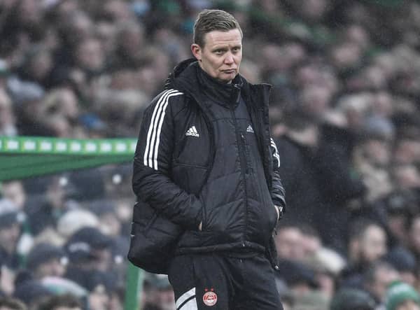 Aberdeen Interim manager Barry Robson sported a dejected look as his side could not prove competitive in losing 4-0 at Celtic Park. (Photo by Ross MacDonald / SNS Group)