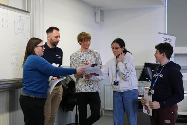 Tom Rocks Maths with students at Maths Masterclass Final