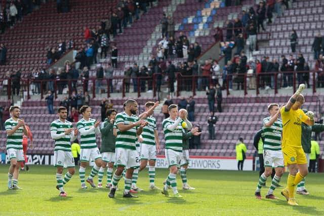 Celtic take the acclaim of their support after the 3-0 win over Hearts at Tynecastle.
