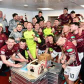 Stenhousemuir get the title party started in their dressing-room after winning League Two.