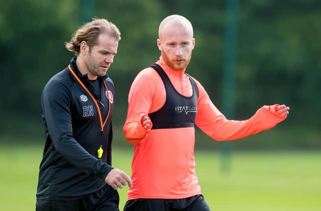 Hearts manager Robbie Neilson and striker Liam Boyce.