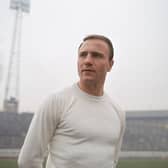 George Cohen poses in his 1965 Fulham strip (Picture: Don Morley/Allsport/Getty)