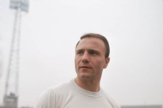 George Cohen poses in his 1965 Fulham strip (Picture: Don Morley/Allsport/Getty)