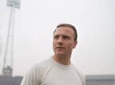 George Cohen poses in his 1965 Fulham strip (Picture: Don Morley/Allsport/Getty)