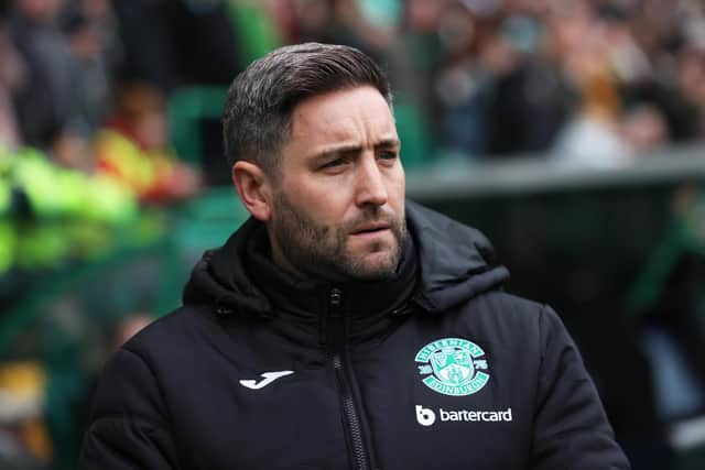 Hibs manager Lee Johnson watches on as his team go down 3-0 to Hearts.