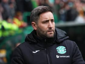 Hibs manager Lee Johnson watches on as his team go down 3-0 to Hearts.