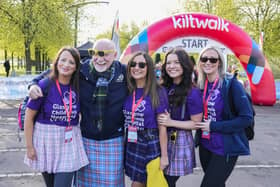 Sir Tom Hunter shares a laugh with Kiltwalkers ahead of the biggest ever Kiltwalk at the Glasgow Green start line