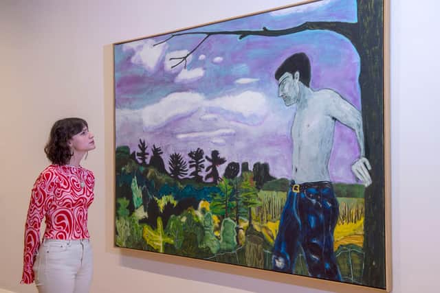 Peter Doig's painting At the Edge of Town has gone on display at the Scottish National Gallery of Modern Art. Picture: Neil Hanna