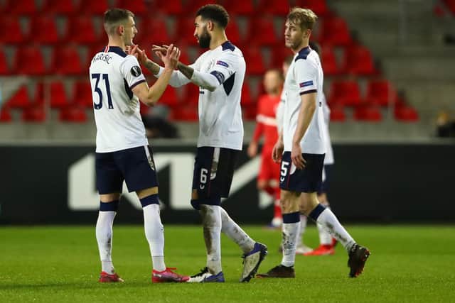 Borna Barisic, Connor Goldson and Filip Helander of Rangers celebrate following the UEFA Europa League Round of 32 match between Royal Antwerp FC and Rangers FC at Bosuilstadion on February 18, 2021 (Photo by Dean Mouhtaropoulos/Getty Images)