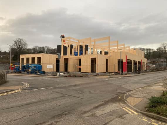 Building work is progressing on creating a new family resource centre, a library and a council office