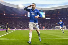 Rangers' Scott Wright salutes the crowd after scoring his team's second goal at Hampden against Hearts.