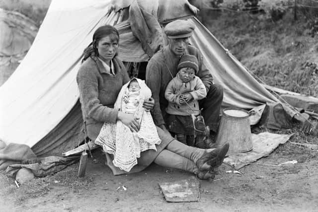 A young Gypsy/Traveller family outside their tent at Blacklaw, by Rattray, in 1933. Picture: Perth & Kinross Council