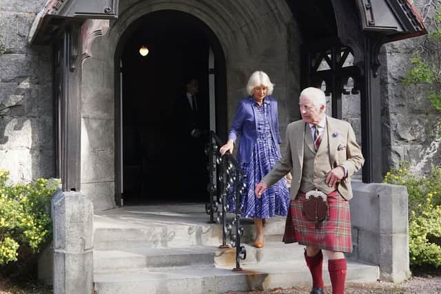 The King and Queen at Crathie Kirk last summer. They last attended a service at the church on January 14 ,just days before their January stay at Balmoral was cut short when they returned to London so the King could undergo corrective treatment for an enlarged prostate. PIC:  Andrew Milligan/PA Wire