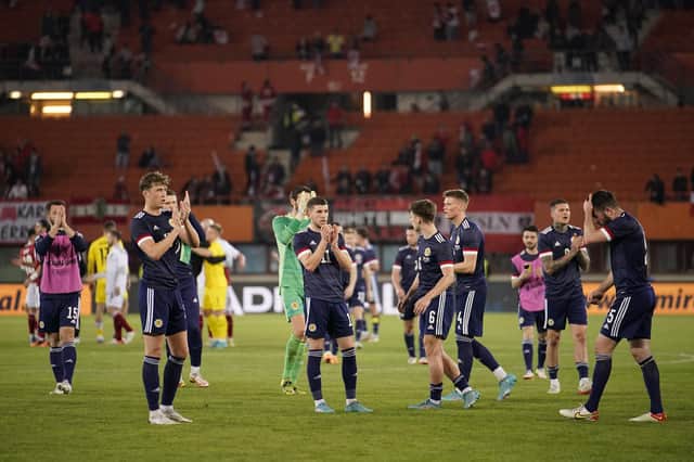 Scotland players applaud the travelling support in Vienna at full time.