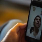 Nazanin Zaghari-Ratcliffe speaking on FaceTime with her husband Richard while still in Iran Photo: Darius Bazargan.