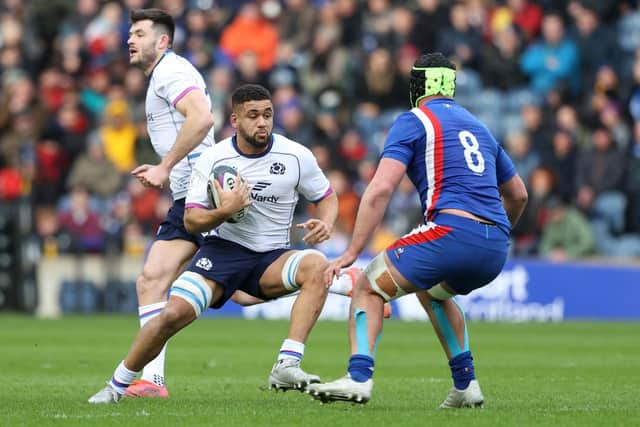Andy Christie takes on France's Grégory Alldritt during his Scotland debut in the 2022 Six Nations match at Murrayfield. (Photo by Craig Williamson / SNS Group)