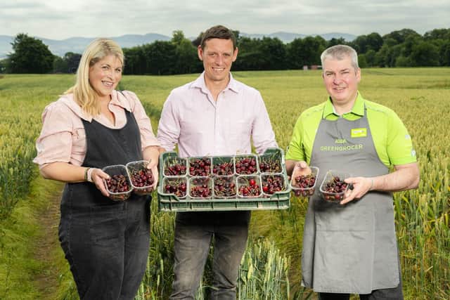 Growers and Owners Jennifer Marshall and Rowan Marshall with Asda Produce Colleague Martin Ferguson