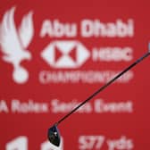 Connor Syme tees off on the 11th hole in the third round of the Abu Dhabi HSBC Championship at Yas Links. Picture: Ross Kinnaird/Getty Images.