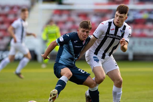 Raith's Kai Kennedy (left) is challenged by Josh Edwards of Dunfermline during the Premiership play-off quarter-final first leg at East End Park. (Photo by Ross Parker / SNS Group)