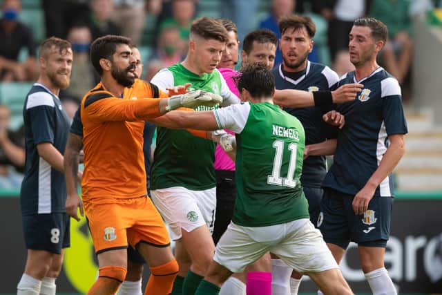 Hibs midfielder Joe Newell reacts angrily after being sent off against Santa Coloma.