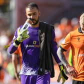 Dundee United's Mark Birighitti and Craig Sibbald looks dejected at full time following the 3-1 defeat by Ross County.