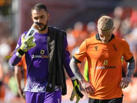 Dundee United's Mark Birighitti and Craig Sibbald looks dejected at full time following the 3-1 defeat by Ross County.