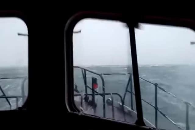 The video shows the view from inside the wheelhouse as Dunbar's lifeboat crew battled through the swell to get to the harbour (Photo and video credit: RNLI Dunbar Lifeboats / Alistair Punton).