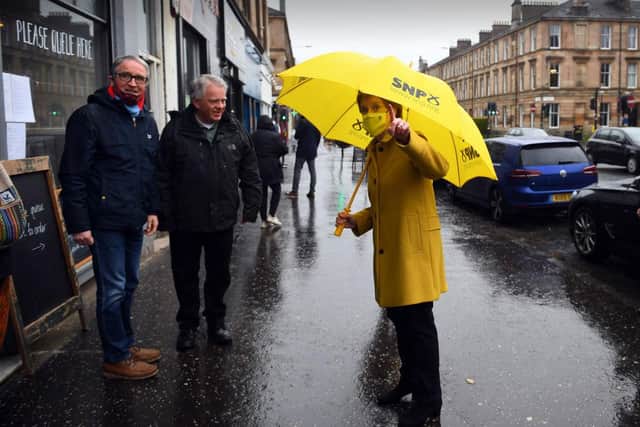 Scotland's First Minister Nicola Sturgeon, talks to members of the public as she campaigns for the Scottish Parliament election in her Glasgow Southside constituency.