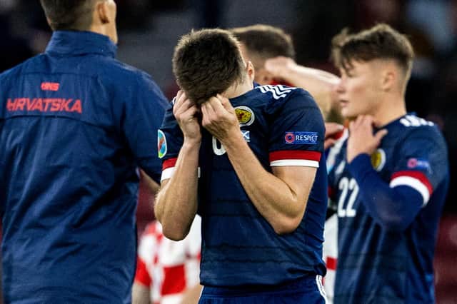 Scotland's Kieran Tierney can't hide his disappointment at full time.