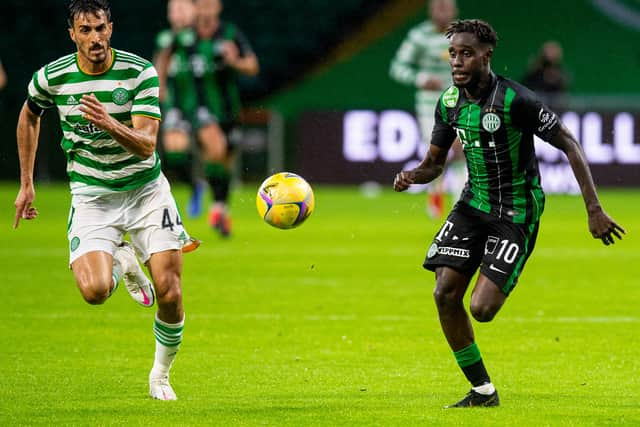 Celtic's Champons League qualifier against Ferencvaros last year did not have a Budapest leg because of the Covid-19 pandemic restraints. It was settled in a one-off tie, with the Hungarians' matchwinner Tokmac Nguen pictured here jostling for possession with Celtic's Hatem Abd Elhamed.  (Photo by Ross MacDonald / SNS Group)