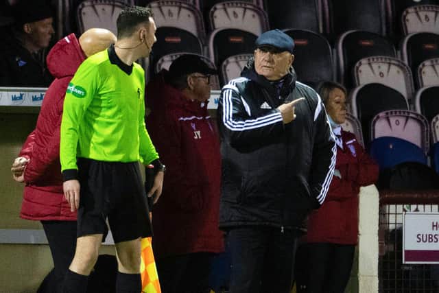 Campbell speaks to the linesman during a match against Raith Rovers at Gayfield.
