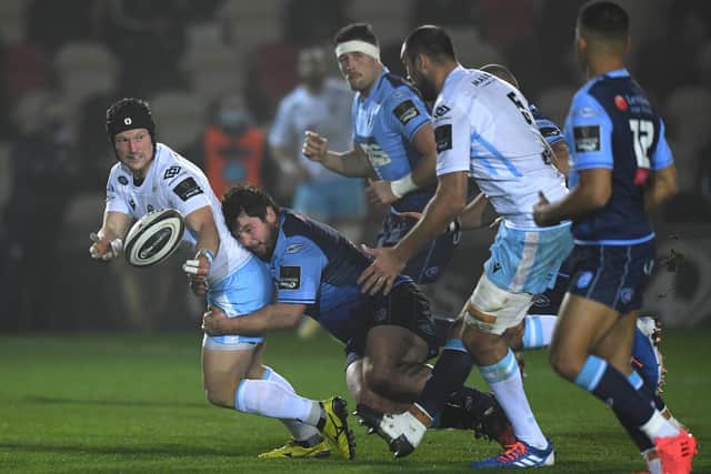 Brad Thyer is pictured tackling Glasgow Warriors' Pete Horne last season. Glasgow have signed the prop on loan from Cardiff. (Photo by Stu Forster/Getty Images)