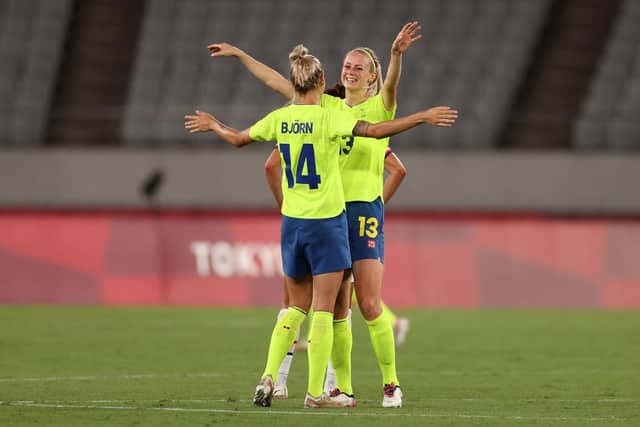 Amanda Ilestedt of Sweden celebrates victory with team mate Nathalie Bjorn after the Women's First Round Group G match between Sweden and United States during the Tokyo  Olympics 2020. (Photo by Dan Mullan/Getty Images)