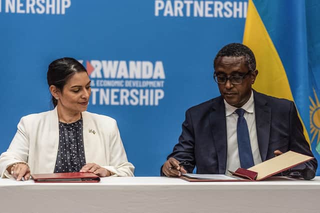 Home Secretary Priti Patel and Rwandan Minister of Foreign Affairs and International Cooperation Vincent Biruta, sign the agreement for asylum seekers to be sent to Rwanda