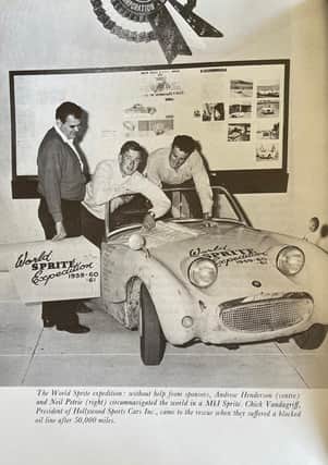 Andrew Henderson (centre) with associates and the globe-spanning Austin Healey Sprite