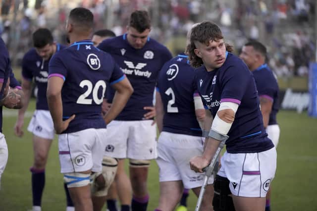Kyle Rowe suffered a serious knee injury on his Scotland debut against Argentina. (AP Photo/Natacha Pisarenko)