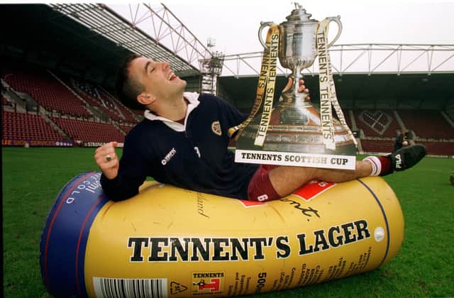 Paul Ritchie larks about with the Scottish Cup a few days before he got his hands on it for real