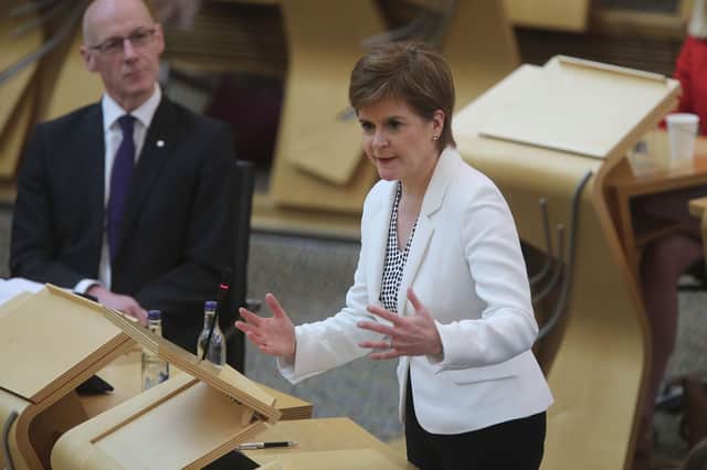 Like Boris Johnson, Nicola Sturgeon must make a judgement as best she can about the balance between opening up the economy and controlling the spread of coronavirus (Picture: Fraser Bremner - WPA Pool/Getty Images)
