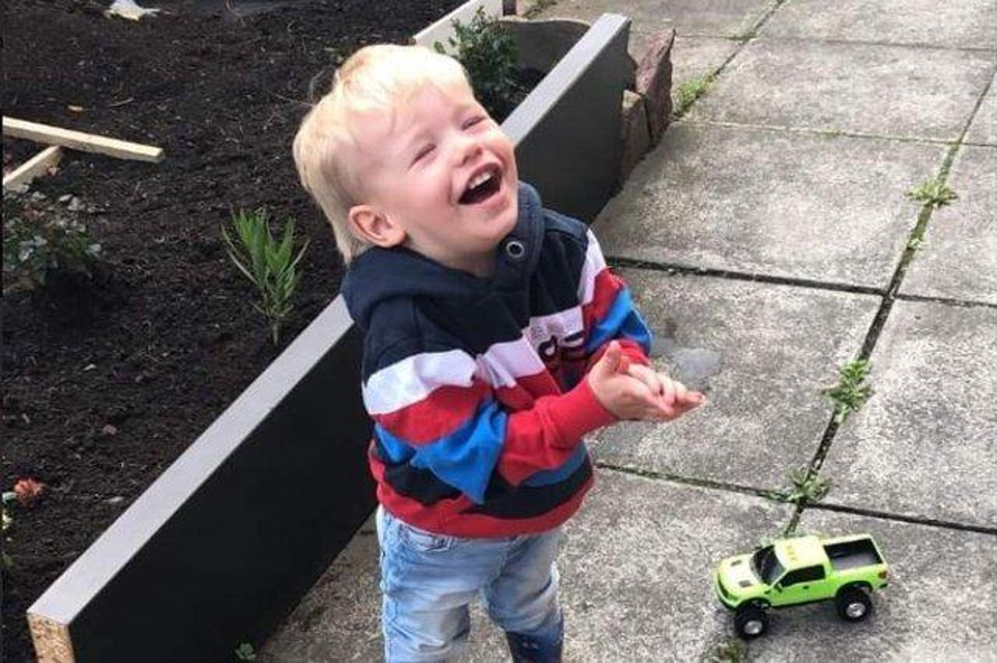 A dad killed his two-year-old son to "get back" at the tot's mum, a court has been told
