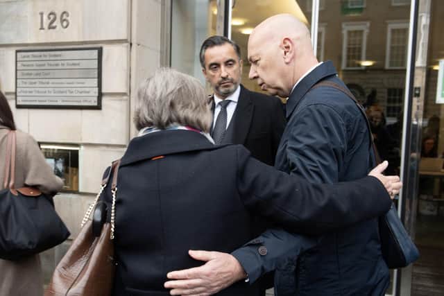 Bereaved relatives Alan Inglis (right), Margaret Waterton (left), and lead solicitor for the Scottish Covid Bereaved, Aamer Anwar (centre), arrive for a hearing at the Covid-19 pandemic inquiry at George House in Edinburgh. Photo: Lesley Martin/PA Wire