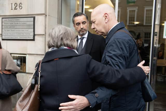 Bereaved relatives Alan Inglis (right), Margaret Waterton (left), and lead solicitor for the Scottish Covid Bereaved, Aamer Anwar (centre), arrive for a hearing at the Covid-19 pandemic inquiry at George House in Edinburgh. Photo: Lesley Martin/PA Wire