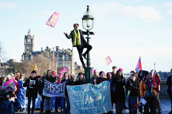 People gather at the Mound in central Edinburgh to highlight the need for a fair pay deal for Scotland's teachers, as teachers continue to take strike action in a dispute over pay. Picture date: Wednesday January 25, 2023.