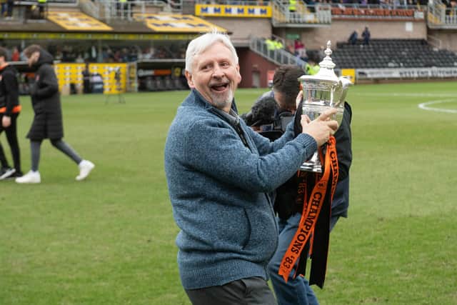Paul Sturrock back at Tannadice before a game with St Johnstone in February with the Scottish league championship trophy won by Dundee United in 1983   (Photo by Mark Scates / SNS Group)