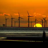 Energy generators, like wind farm companies, must pay higher transmission costs the further north they are under an out-dated policy, says Kenny MacAskill (Picture: Peter Byrne/PA)