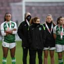 Hibs players look dejected as they receive their runners-up medals after losing 2-0 to Rangers in the SWPL Sky Sports Cup final at Tynecastle Park. (Photo by Mark Scates / SNS Group)