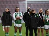 Hibs players look dejected as they receive their runners-up medals after losing 2-0 to Rangers in the SWPL Sky Sports Cup final at Tynecastle Park. (Photo by Mark Scates / SNS Group)