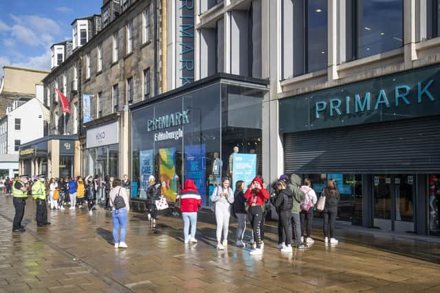 People queue outside the flagship Scottish Primark store on Princes Street in Edinburgh after it reopened following the initial spring 2020 lockdown. Picture: Jane Barlow/PA Wire