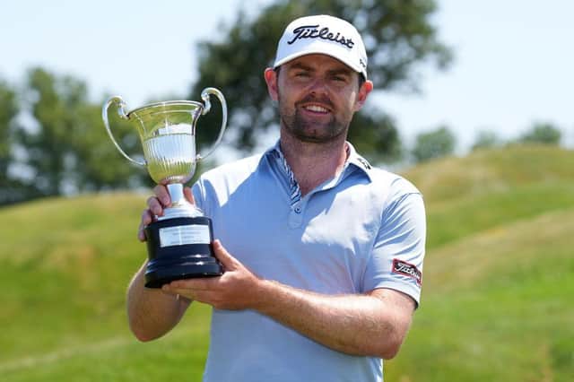 Liam Johnston shows off the trophy after winning Emporda Challenge at Emporda Golf Club in Girona. Picture: Alex Caparros/Getty Images.